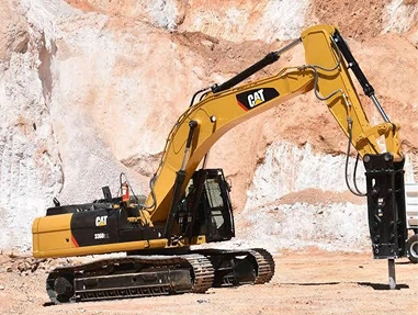 Excavadoras 320 con kit para martillo
